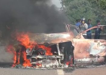 Miraculous escape for 3 after car hits stray bull and catches fire on national highway