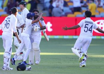 Brisbane: Indian players celebrate after defeating Australia by three wickets on the final day of the fourth cricket test at the Gabba, Brisbane, Australia, Tuesday, Jan. 19, 2021.India won the four test series 2-1.  AP/PTI