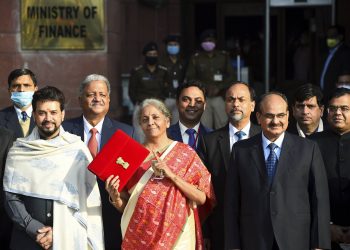 New Delhi: Finance Minister Nirmala Sitharaman holds a folder case containing the Union Budget 2021-22 as she poses for a group photograph with MoS Finance Anurag Thakur and other members of finance ministry, at North Block in New Delhi, Monday, Feb. 1, 2021. (PTI Photo/Kamal Singh)(PTI02_01_2021_000015A)(PTI02_01_2021_000018B)