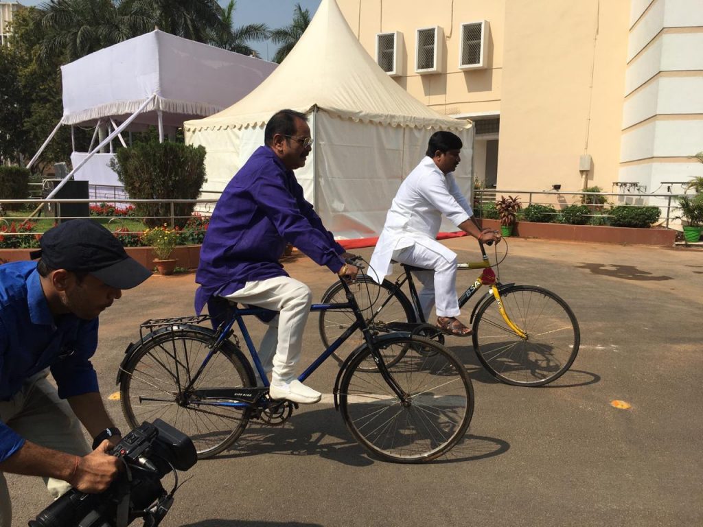 Congress MLAs ride bicycle to Assembly