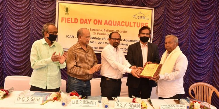 Fish farmer Padmashri Batakrushna Sahu being felicitated for acting as a role model for others in practicing scientific fish farming.