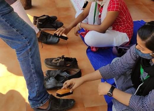 Agitating OUAT Forestry students polish shoes