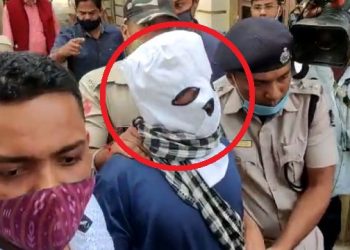 File photo of Bibekananda Biswal being arrested by Commissionerate Police