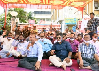 Protesting bankers holding a sit-in as part of a nationwide bank strike in front of UCO Bank at Master Canteen in Bhubaneswar (File photo)