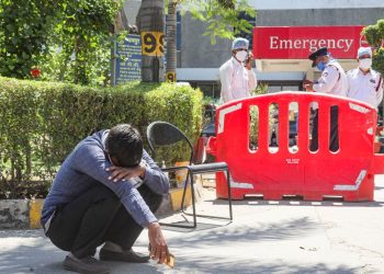 A man breaks down after losing his relative at Jaipur Golden Hospital in New Delhi’s Rohini area. (File Photo: PTI)