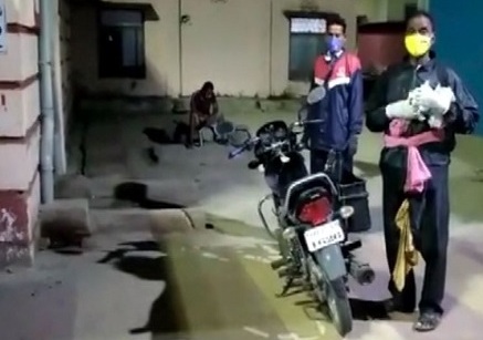 Bargarh Raincoat clad COVID patient rides to hospital in absence of ambulance, PPE kit 