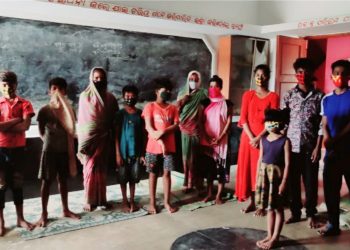 People at a cyclone shelter in Bhadrak district