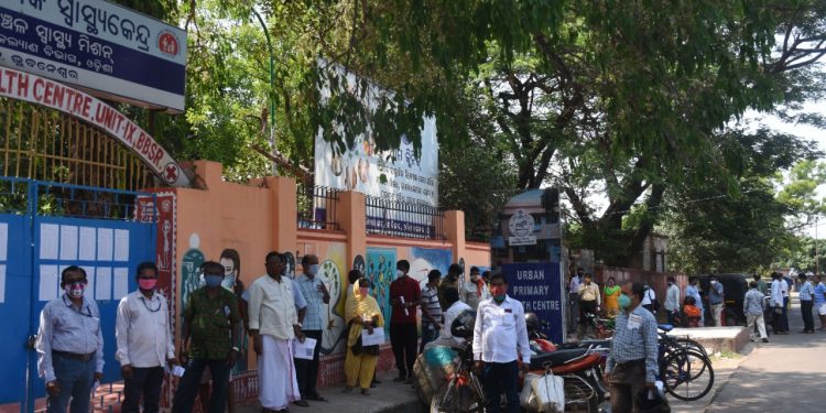 People queue up in large numbers for getting the jab at a health centre in Unit-IX