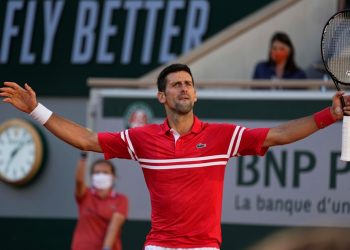 On top of the world: Novak Djokovic is all pumped up after winning the French Open men’s singles crown Sunday in Paris  (PTI Photo)