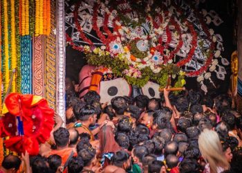 Lord Jagannath being escorted to His chariot Nandighosha