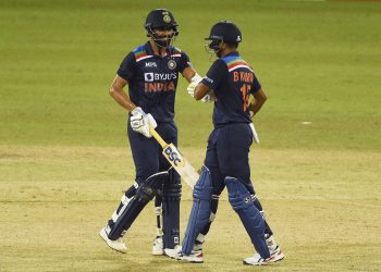 Deepak Chahar (L) gives Bhuvneshwar Kumar a 
fist-bump during their match-winning partnership against Sri Lanka