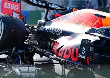 The rear wheel of Max Verstappen’s car is inches away from Lewis Hamilton’s head