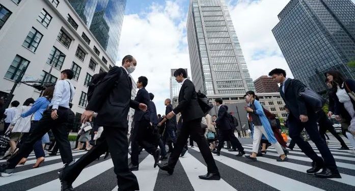 Japan revises GDP to nearly flat, shows fragile recovery