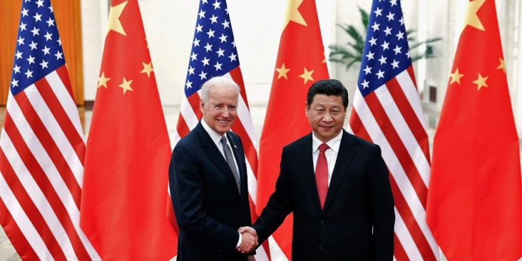 Chinese President Xi Jinping shakes hands with U.S. Vice President Joe Biden (L) inside the Great Hall of the People in Beijing December 4, 2013. (PC: Reuters)
