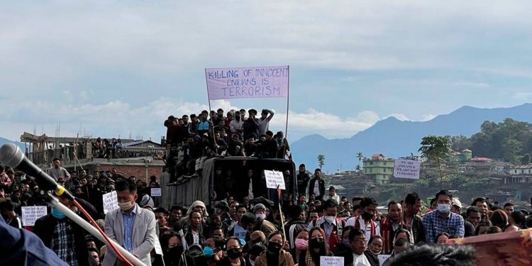 People attend the funeral of civilians killed by security forces in Nagaland (AP)