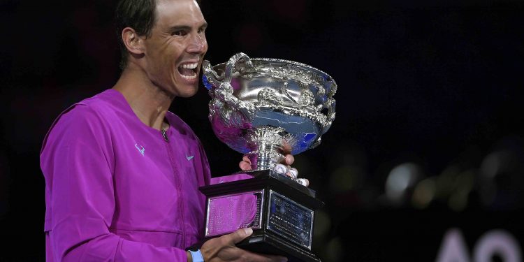 Rafael Nadal holds the Norman Brookes Challenge Cup after defeating Daniil Medvedev of Russia in the men's singles final at the Australian Open