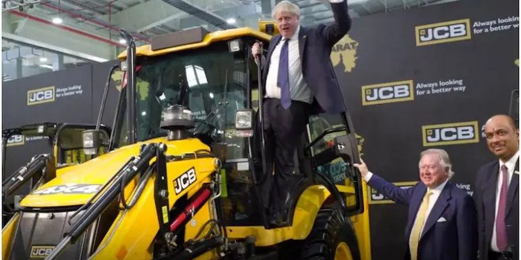 Boris Johnson hopped onto a JCB vehicle during his visit to a JCB factory in Gujarat (Image: BorisJohnson/Twitter)