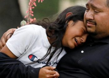 People console each other after another mass shooting at a school in the US [PC: Reuters]