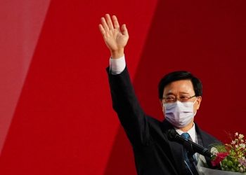 John Lee waves after he was elected as Hong Kong's chief executive [Reuters]