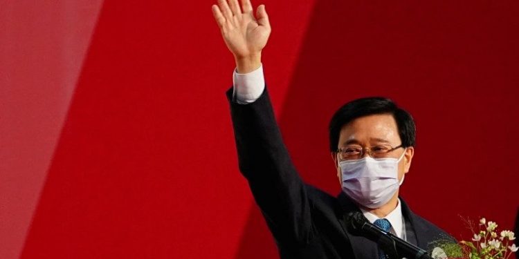 John Lee waves after he was elected as Hong Kong's chief executive [Reuters]