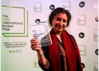 Author Geetanjali Shree poses with the 2022 International Booker Prize award for her novel 'Tomb of Sand' in London. (AP/PTI)