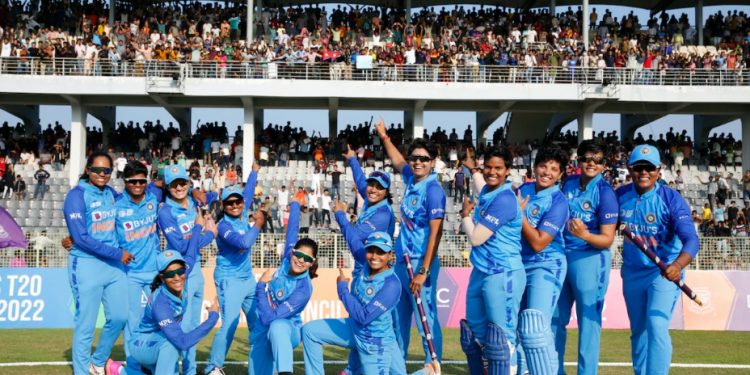 Members of the Indian women's cricket team celebrate after their win in the Asia Cup final, Saturday