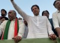 Imran khan begins long march with guns aimed at ISI chief