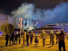 At least 13 killed after Russian warplane crashes near apartment