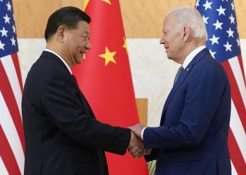 US President Joe Biden (R) and Chinese President Xi Jinping shake hands before their meeting on the sidelines of the G20 summit meeting, November 14, 2022, in Nusa Dua, in Bali, Indonesia. (AP Photo/Alex Brandon)