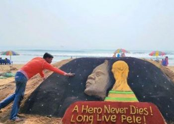 Sand artist Manas Sahoo creates Pele sculpture on Odisha beach