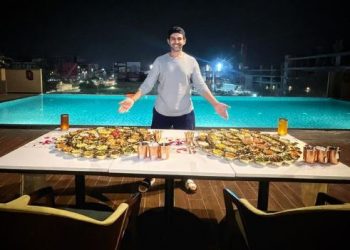 Foodie Kartik Aaryan poses with massive Gujarati thalis