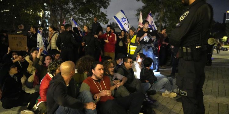 Thousands of Israelis protest new government's policies