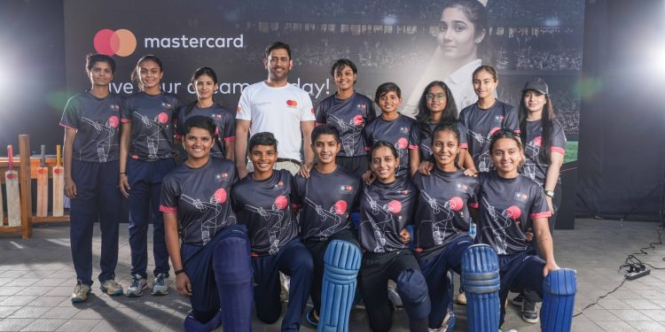 MS Dhoni trains the next generation of women cricketers at 'Cricket Clinic - MSD' workshop. (Image: IANS)