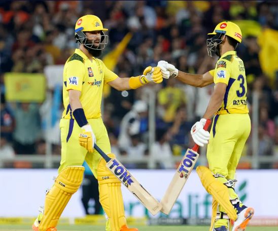 Gaikwad special takes CSK to 178/7 Ahmedabad: Opener Ruturaj Gaikwad was all class in his 92 off 50 balls as Chennai Super Kings posted a challenging 178 for seven against defending champions Gujarat Titans in the IPL opener here Friday. Gaikwad regaled the near capacity crowd here with with his sublime strokeplay. It was a display of effortless hitting from Gaikwad, who relied on his lofted drives over extra cover and crisp pull shots to collect as many as nine sixes. Apart from Gaikwad, the only other batter who put the Titans under pressure was Moeen Ali who came up with a 17-ball 23. Ali's flat six off Mohammad Shami on a free-hit ball was the highlight of his cameo. Gaikwad pulled IPL debutant Joshua Little on his very first ball to set the tone of his innings. That over went for 15 runs and with Shami conceding 17 runs in the following over, CSK got the momentum they were looking for. Titans' trump card Rashid Khan was introduced in the powerplay and as he often does, he got the wicket that his team was looking for by getting the dangerous looking Ali caught behind. Rashid's second over saw him getting rid of England Test captain Ben Stokes, who too was caught by wicketkeeper Wriddhiman Saha, leaving CSK at 70 for three. However, the fall of wickets did not make Gaikwad change his game as he kept getting the boundaries. He welcomed Alzarri Joseph into the attack by smashing him for three sixes in the eighth over. Titans did well to stem the flow of runs in the middle overs and got the wicket of Ambati Rayudu. Shivam Dube struggled to find the big hits and that put pressure on Gaikwad who was caught in the deep in the 17th over and missed out on a deserving hundred. Skipper M S Dhoni came out to bat at number eight but still managed to make an impact as he pulled Little for a six before flicking him for a four in the final over, sending the crowd into a frenzy. Kane Williamson injured his knee while fielding at the boundary and limped off the field. The last five overs yielded 45 runs for CSK. PTI IPL, CSK, GT, Ruturaj Gaikwad