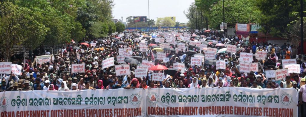 Outsourcing employees hit streets for job regularisation