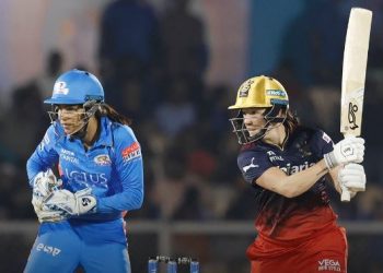 Megan Schutt's crucial 20 runs off 14 balls helps RCB put a total of 155 against MI (Image: RCBTweets/Twitter)