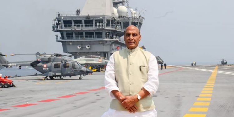 Rajnath Singh addresses top naval commanders onboard INS Vikrant (Image: rajnathsingh/Twitter)