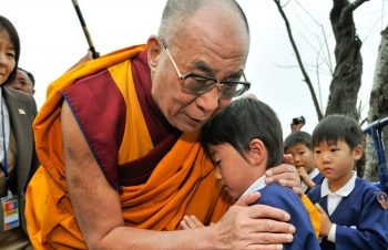 Dalai Lama apologises to boy, his family after row over video