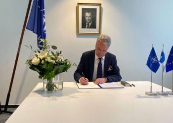 Finnish Foreign Minister Pekka Haavisto signing Finland’s instrument of accession to NATO (Image: P_Kallioniemi/Twitter)