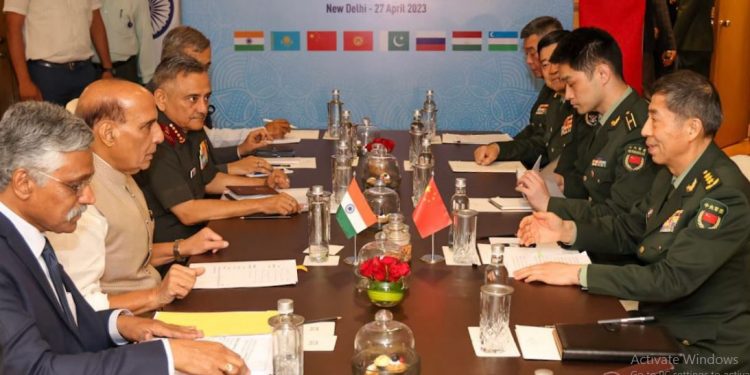 Defence Minister Rajnath Singh meets his Chinese counterpart Li Shangfu (Image: rajnathsingh/Twitter)