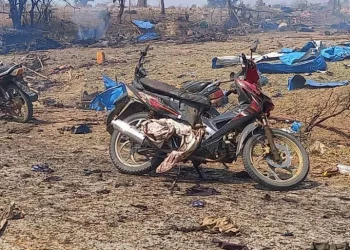 Photo provided by the Kyunhla Activists Group shows aftermath of this week's air attack on a village in Sagaing Region [Kyunhla Activists Group via AP Photo]