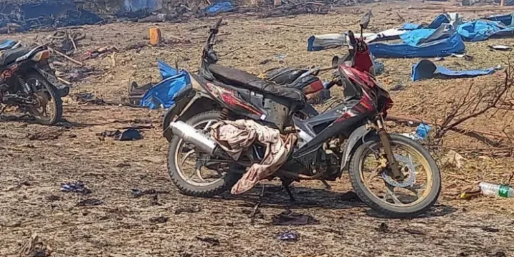 Photo provided by the Kyunhla Activists Group shows aftermath of this week's air attack on a village in Sagaing Region [Kyunhla Activists Group via AP Photo]
