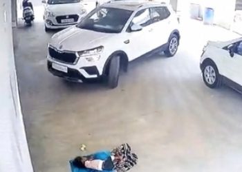 Car runs over toddler