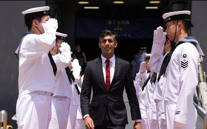 UK PM Rishi Sunak clinches 'historic' Hiroshima Accord on Japan visit London: British Prime Minister Rishi Sunak and his wife Akshata Murty arrived in Japan on Thursday for the G7 Summit, on the sidelines of which he clinched a new so-called “Hiroshima Accord” for greater UK-Japan economic, security and technology collaboration. This new UK-Japan global strategic partnership is being seen as a counterbalance to Chinese dominance in the region and also includes a Semiconductors Partnership to pursue “ambitious” R&D cooperation and skills exchange to bolster supply chain resilience in the key sector. The UK also confirmed that its Carrier Strike Group (CSG) warship will return to the Indo-Pacific in 2025, following a maiden voyage to the region including India in 2021, as Sunak became the first British Prime Minister to visit Hiroshima – the site of the Second World War atomic bombing. “It is a privilege to be visiting Tokyo and Hiroshima at this historic moment in the United Kingdom's relationship with Japan,” the British-Indian leader said. “Prime Minister [Fumio] Kishida and I are closely aligned on the importance of protecting peace and security in the Indo-Pacific and defending our values, including free and fair trade. The Hiroshima Accord will see us step up cooperation between our armed forces, grow our economies together and develop our world-leading science and technology expertise. It marks an exciting next phase in the UK and Japan's flourishing partnership,” he said. The Hiroshima Accord will cover agreements on defence, trade and investment, science and technology collaboration, and joint work on tackling global issues like climate change. Downing Street said Japan's “pivotal role” in the Indo-Pacific makes strong relations with the nation central to the UK's security and prosperity. In Tokyo, Sunak visited a naval base to confirm new UK-Japan defence cooperation which includes doubling UK troop numbers in upcoming joint exercises and agreeing on a formal Consult Clause, whereby the UK and Japan commit to consult each other on important regional and global security issues and consider measures in response. The CSG fleet, consisting of an aircraft carrier, escorts and aircraft, to be deployed in 2025 will work alongside the Japanese Self-Defence Forces and other regional partners to help defend peace and stability in the Indo-Pacific, Downing Street said. Meanwhile, it was also announced that leading Japanese businesses have committed to invest almost GBP 18 billion in businesses and projects across the UK. “These new investments are a massive vote of confidence in the UK's dynamic economy, from some of Japan's top firms. Working with the government and British industry they will create the kind of high-quality, reliable jobs and transformative local investment we are delivering around the country,” said Sunak. The British prime minister added that the “sky's the limit” for British and Japanese businesses and entrepreneurs as bilateral trade ties grow, including through the Japan-included Comprehensive and Progressive Agreement for Trans-Pacific Partnership (CPTPP) trade bloc which the UK had joined recently. According to official statistics, Japan is the UK's fifth largest investor with GBP 92 billion invested in the UK, and trade in goods and services was worth GBP 27.7 billion last year. The new investments announced this week include funding for offshore wind, low-carbon hydrogen and other clean energy projects from Japanese trading house Marubeni. Mitsubishi Estate and Mitsui Fudosan, two of the largest real estate companies in Japan, confirmed plans to invest in affordable housing, high-quality office space and a life-science laboratory in the UK. While Sumitomo Corporation intends to expand its UK offshore wind projects, Sumitomo Electric Industries has also announced its decision to build a strategically important high-voltage cable manufacturing plant in the Scottish Highlands. The UK and Japanese governments also unveiled a new Renewable Energy Partnership, which includes building business partnerships to accelerate the deployment of clean energy. PTI