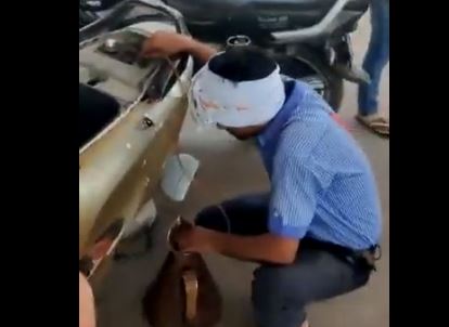 Viral video of petrol pump worker drains fuel from scooter after customer offers Rs 2,000 note