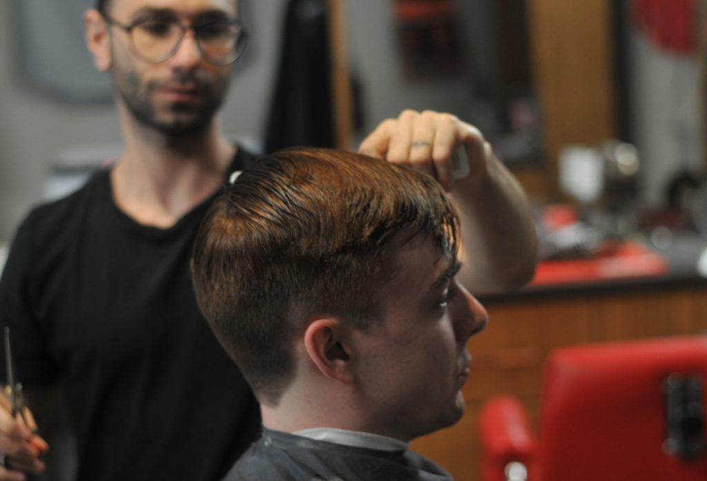 Boy takes loan to pay for his haircut