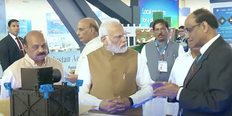 PM Narendra Modi in conservation with Pixxel officials at Aero India 2023