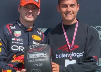 Paulo Dybala presenting British Grand Prix trophy to Max Verstappen