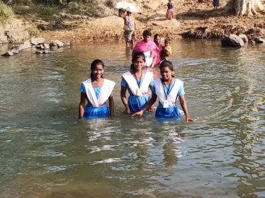 Odisha_Students swim across river to attend school in Gajapati district