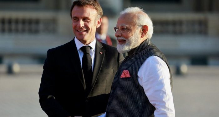 French President Emmanuel Macron and Indian Prime Minister Narendra Modi shake hands ahead of a dinner held at the Louvre in Paris. (PC: Reuters)